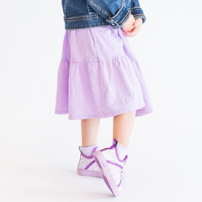 Purple high top girls Shoe illustrating pull tab for easy slip on