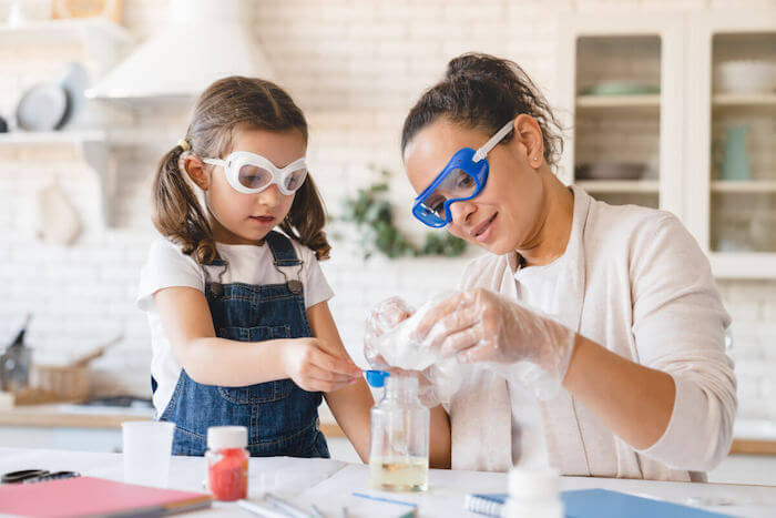 Mother and Daughter performing at Home Science Project